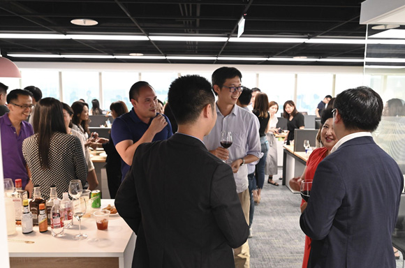 People mingling at Hoffman Taiwan open house