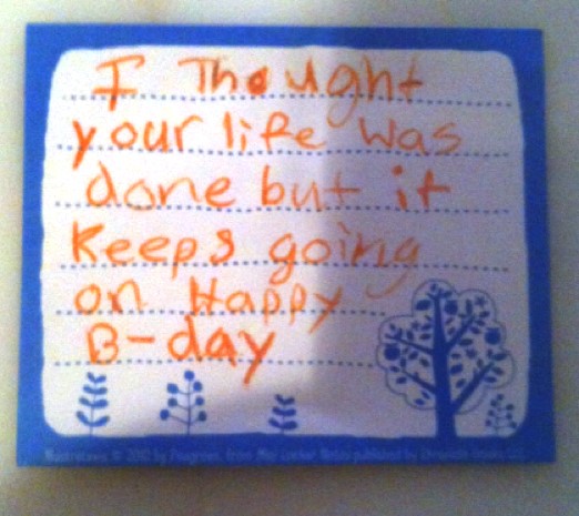"...it keeps going on" Birthday card drawn in orange crayon